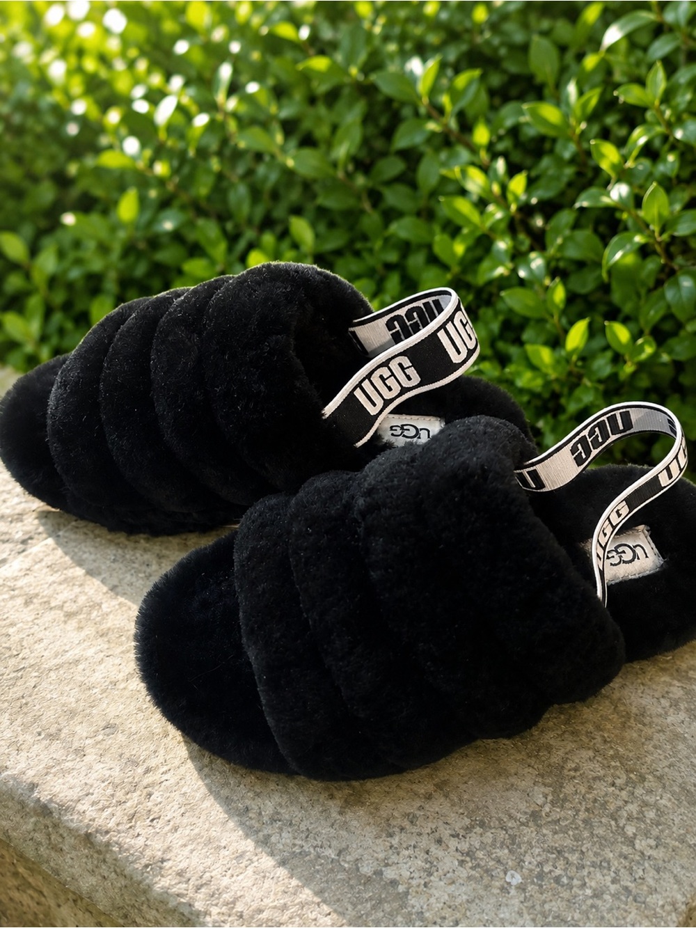 UGG Black Shearling Slide Boots with Logo Strap